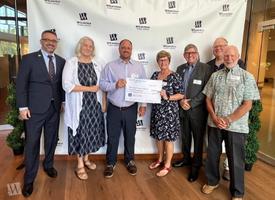 Avery Hall Insurance big check photo