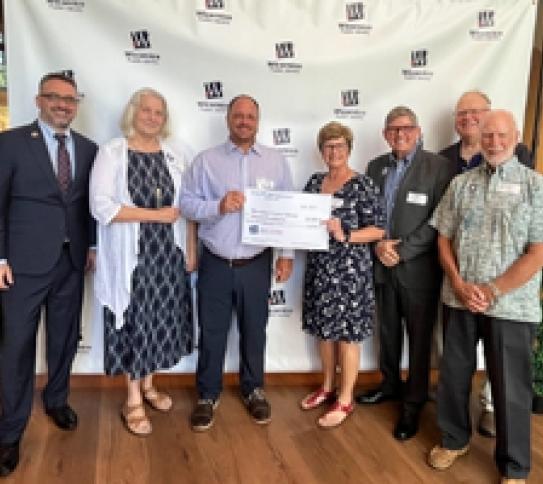 Avery Hall Insurance big check photo