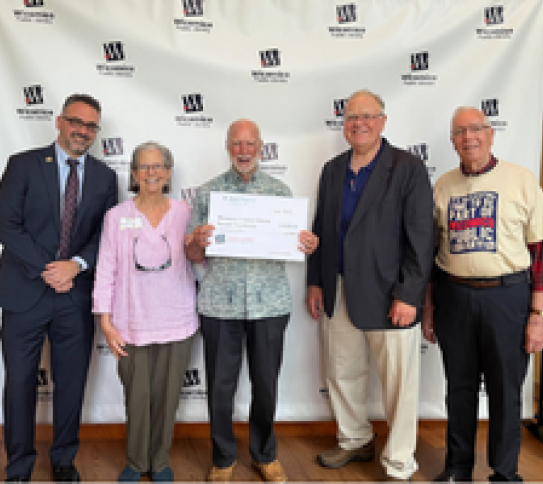 Scott Duncan with Big Check