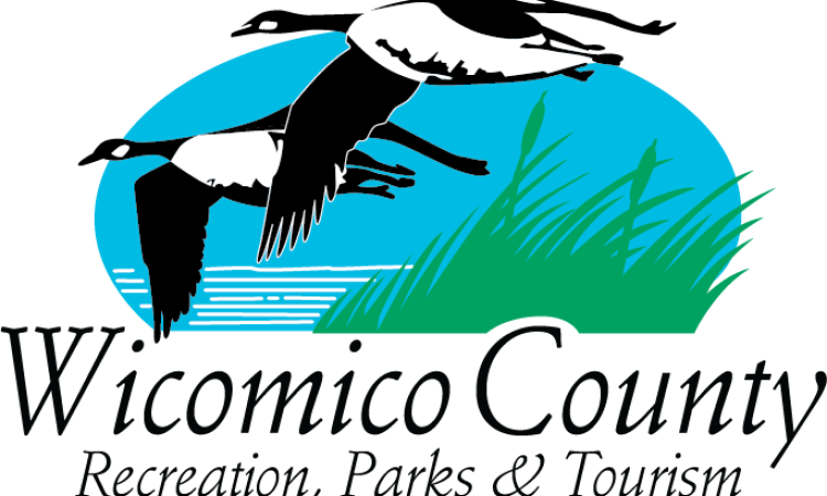 Two geese flying over the water. The logo for the Wicomico County Recreation, Parks & Tourism Department